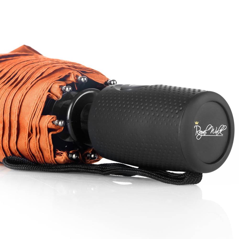Folding umbrella with comfortable gripped handle - Orange Folding umbrella with comfortable gripped handle - Orange